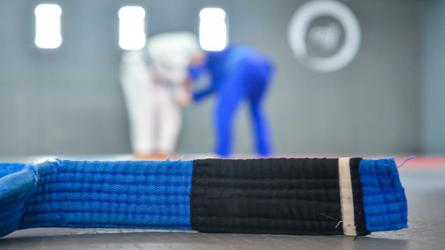 Picture shows a bjj blue belt.