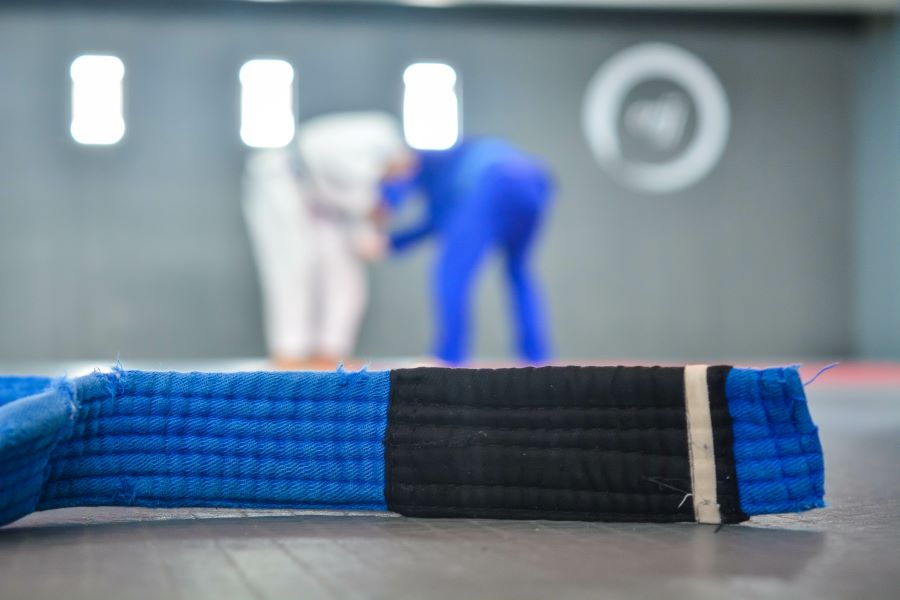 Picture shows a bjj blue belt.