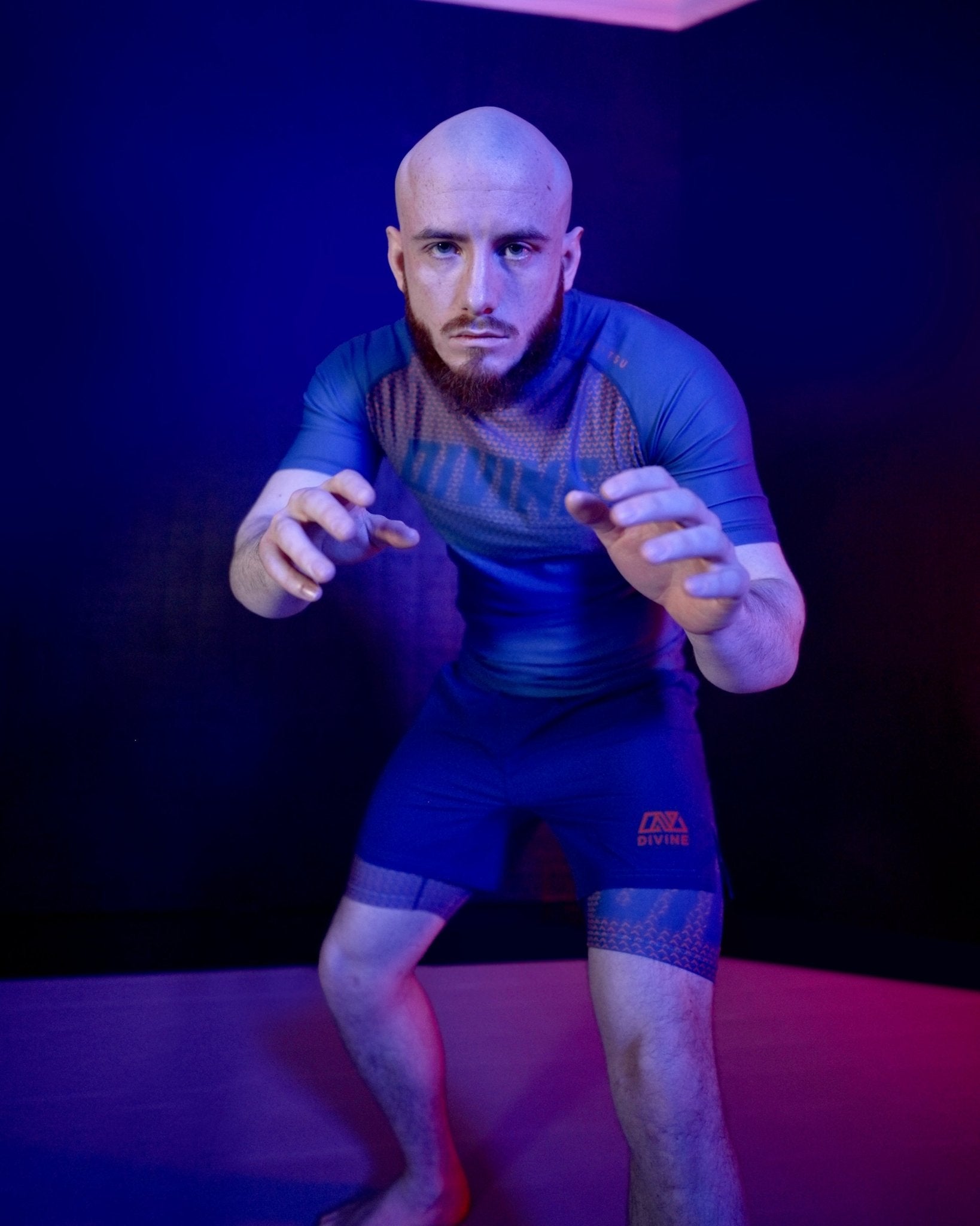 No-gi BJJ rashguard by Divine – illenium Rashguard in blue and orange design for grappling