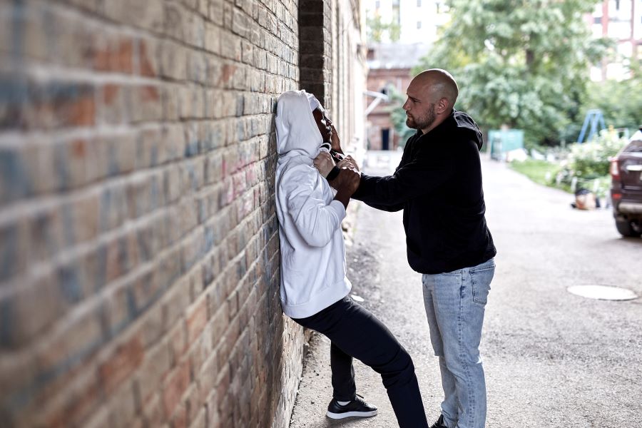 Man and woman in a street altercation. 